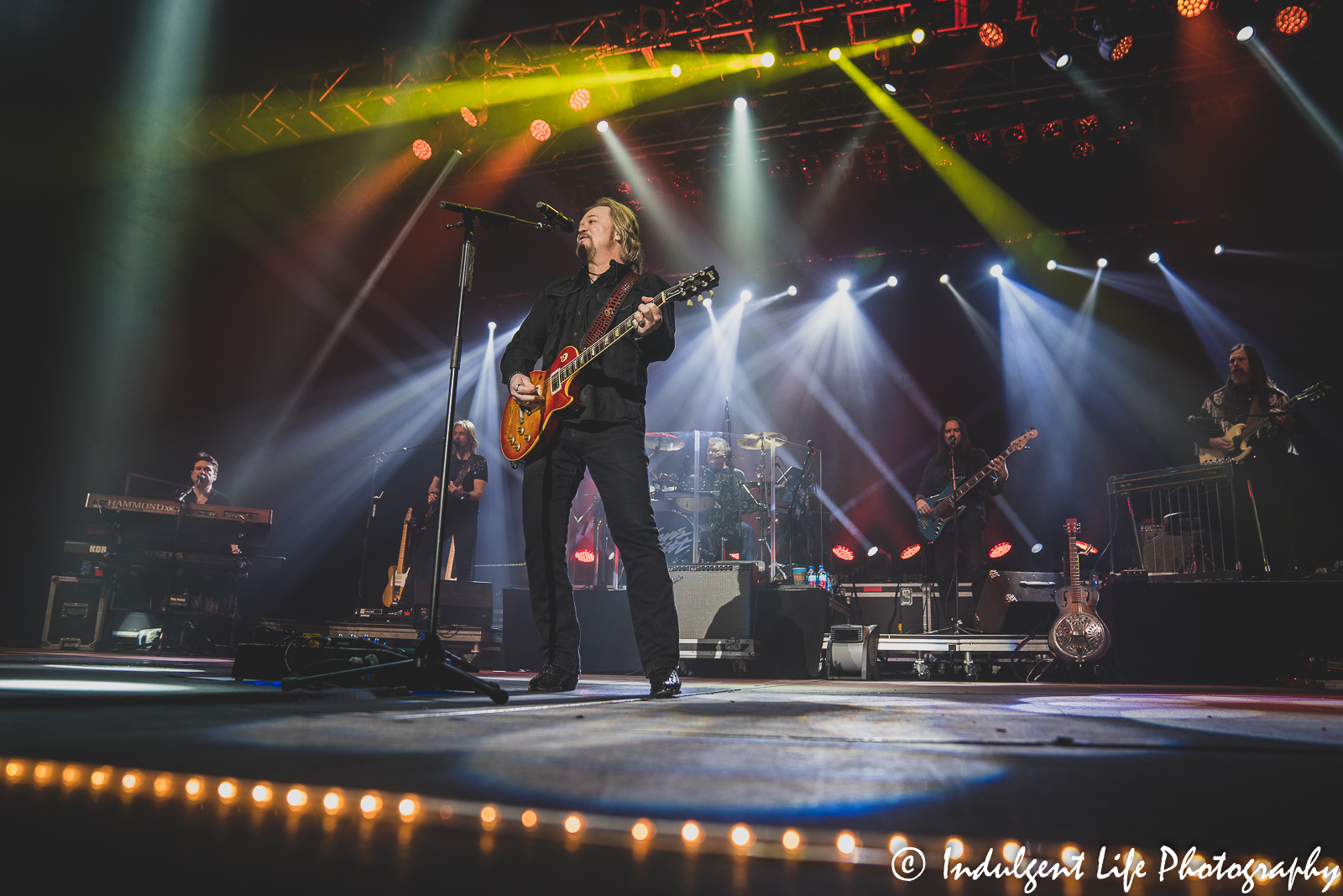Travis Tritt performing on tour